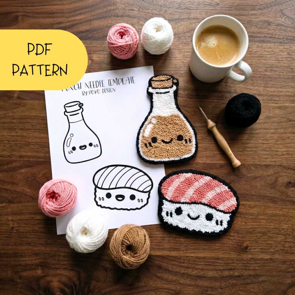 Detailed punch needle embroidery of a salmon nigiri sushi and a smiling soy sauce bottle, showing rich yarn textures and vibrant pink and black colors
